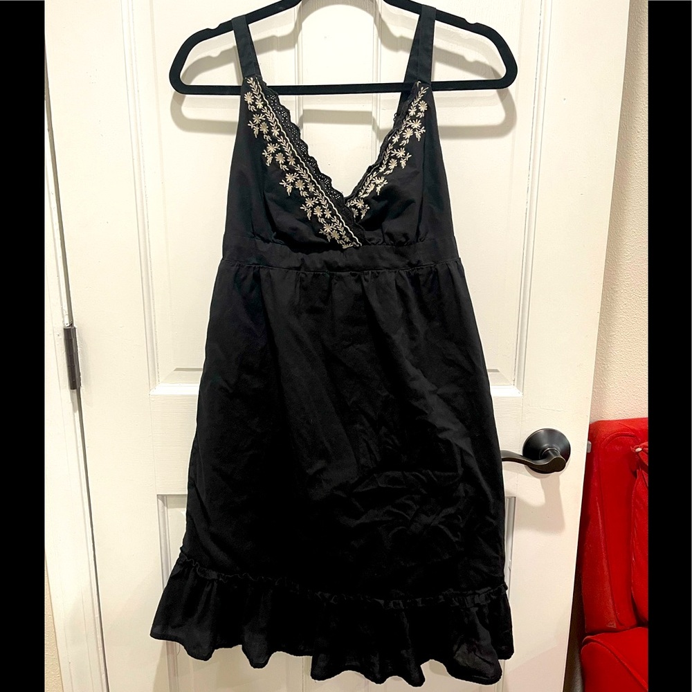 Adorable black summer dress with embroidery.